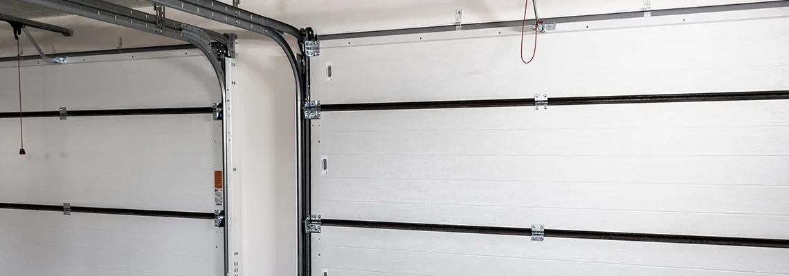 Fix Folding Garage Door Jerking in Homestead