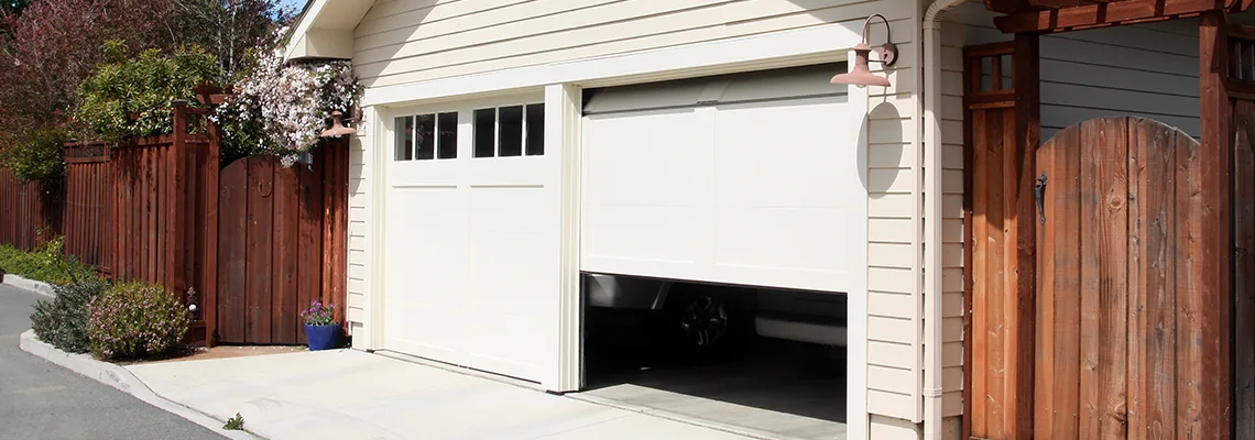 Fix Metal Garage Door Jerking in Homestead